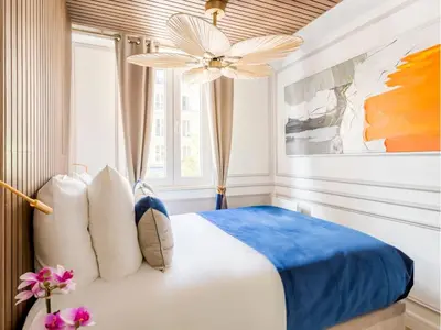 Un ou plusieurs lits dans un hébergement de l'établissement Merveil - Luxury Suite - Notre Dame - Monge