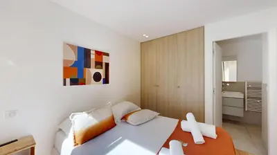 Un ou plusieurs lits dans un hébergement de l'établissement 311 Suite Elisa - Superbe Appartement à Paris.