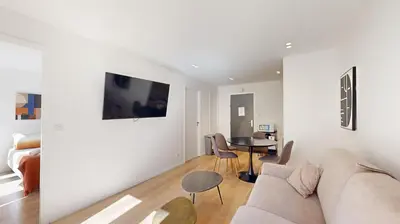 Télévision ou salle de divertissement dans l'établissement 311 Suite Elisa - Superbe Appartement à Paris.