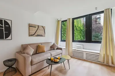 Coin salon dans l'établissement 311 Suite Elisa - Superbe Appartement à Paris.
