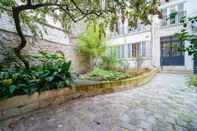 Jardin de l'établissement Spacious Family Apartment near Bastille & Marais