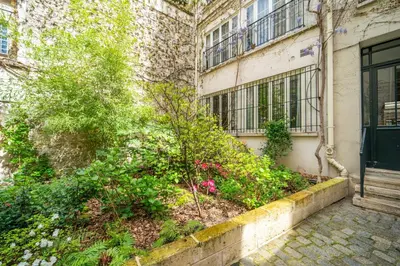 Jardin de l'établissement Charming Garden Apartment in Le Marais