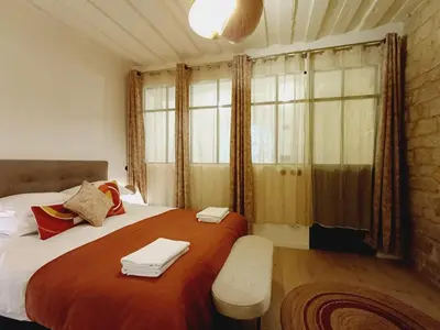 Un ou plusieurs lits dans un hébergement de l'établissement Elegant & Quiet Suite in Le Marais near Hôtel de Ville