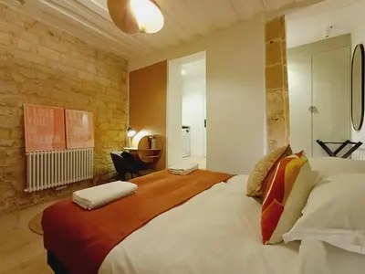 Un ou plusieurs lits dans un hébergement de l'établissement Elegant & Quiet Suite in Le Marais near Hôtel de Ville