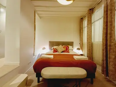 Un ou plusieurs lits dans un hébergement de l'établissement Elegant & Quiet Suite in Le Marais near Hôtel de Ville