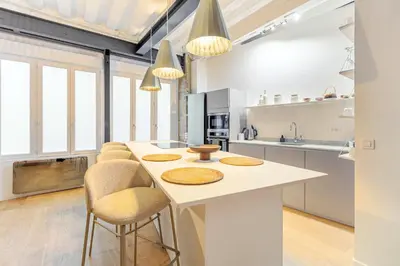 Cuisine ou kitchenette dans l'établissement La Suite de Montorgueil