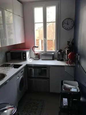 Cuisine ou kitchenette dans l'établissement Roland Garros /Boulogne Billancourt