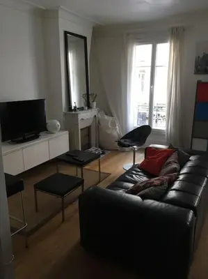 Télévision ou salle de divertissement dans l'établissement Roland Garros /Boulogne Billancourt