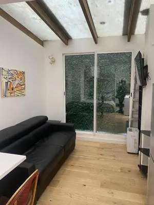 Coin salon dans l'établissement joli studio 2/4 personnes