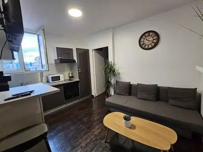 Cuisine ou kitchenette dans l'établissement Appartement Proche Metro Paris