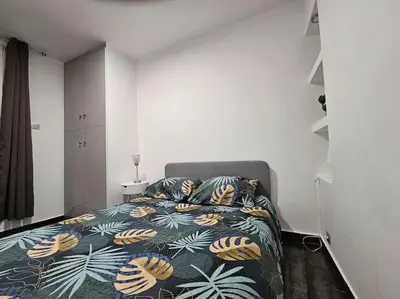 Un ou plusieurs lits dans un hébergement de l'établissement Appartement Proche Metro Paris