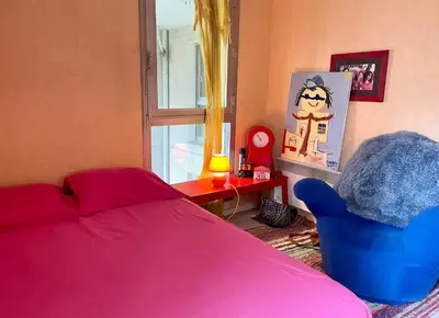 Un ou plusieurs lits dans un hébergement de l'établissement Duplex Paris & Parc des Princes