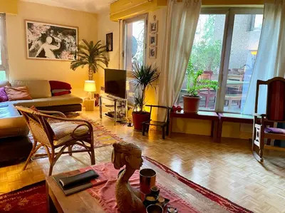 Coin salon dans l'établissement Duplex Paris & Parc des Princes