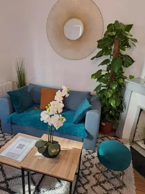 Coin salon dans l'établissement Joli petit 2 pièces