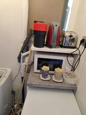 Cuisine ou kitchenette dans l'établissement Joli petit 2 pièces