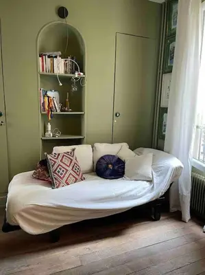 Un ou plusieurs lits dans un hébergement de l'établissement Cosy Nest in Montmartre