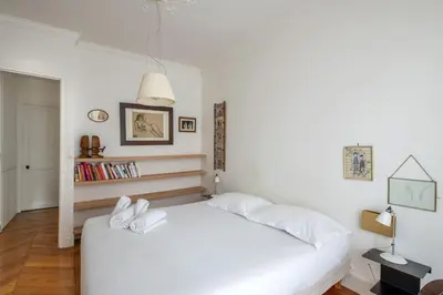 Un ou plusieurs lits dans un hébergement de l'établissement Legendre - Spacieux appartement à Batignolles
