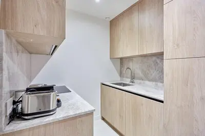 Cuisine ou kitchenette dans l'établissement Apartment Centre de Paris by Studio prestige