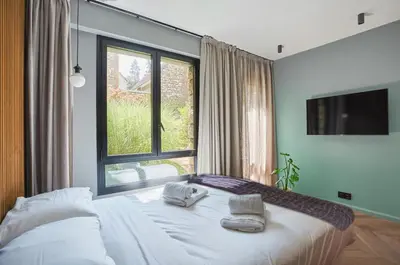 Un ou plusieurs lits dans un hébergement de l'établissement Studio in Neuilly Porte Maillot by Studio prestige