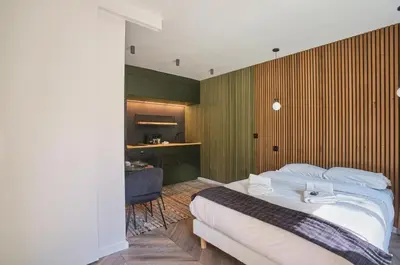 Un ou plusieurs lits dans un hébergement de l'établissement Studio in Neuilly Porte Maillot by Studio prestige