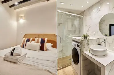 Un ou plusieurs lits dans un hébergement de l'établissement Apartment Le Marais by Studio prestige
