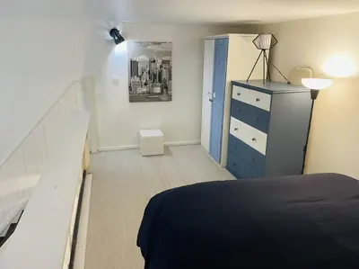 Un ou plusieurs lits dans un hébergement de l'établissement La Pause - Wifi - Champs Élysées - 4 Prs