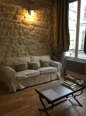 Coin salon dans l'établissement Authentic Apartment Marais