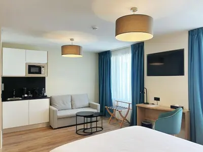 Cuisine ou kitchenette dans l'établissement Hôtel Oden Paris Ivry