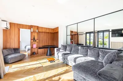 Coin salon dans l'établissement GuestReady - Paris Charm with Montmartre View