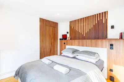 Un ou plusieurs lits dans un hébergement de l'établissement GuestReady - Paris Charm with Montmartre View