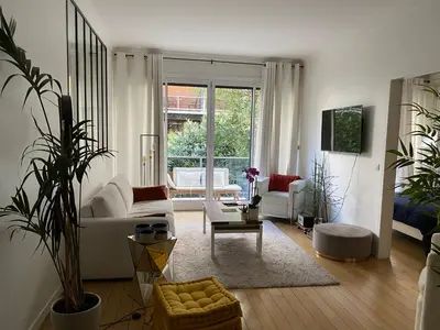 Coin salon dans l'établissement Appartement 65m2 avec balcon