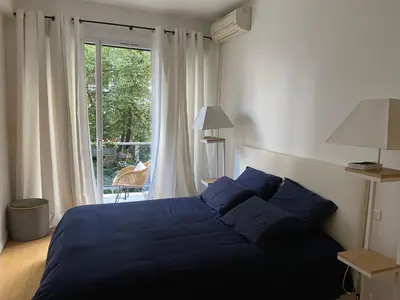 Un ou plusieurs lits dans un hébergement de l'établissement Appartement 65m2 avec balcon