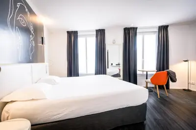 Un ou plusieurs lits dans un hébergement de l'établissement Hôtel Montparnasse Saint Germain