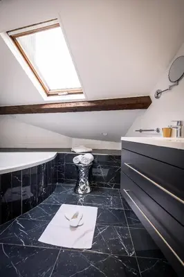 Salle de bains dans l'établissement Hôtel Montparnasse Saint Germain