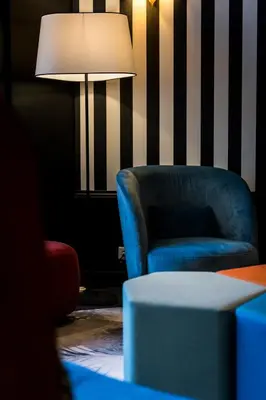 Coin salon dans l'établissement Hôtel Montparnasse Saint Germain