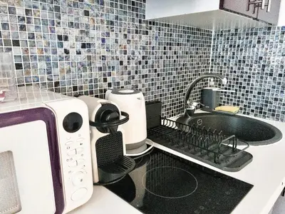 Cuisine ou kitchenette dans l'établissement Mondétour Paris centre - Urban flat