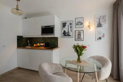 Coin salon dans l'établissement Sweet'Issy - Balcon - Parking - Climatisation - WIFI - MyBestLoc