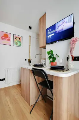 Télévision ou salle de divertissement dans l'établissement Charming studio - 2P - Montmartre - Sacré-Coeur