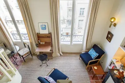 Coin salon dans l'établissement Centrally located duplex Notre Dame