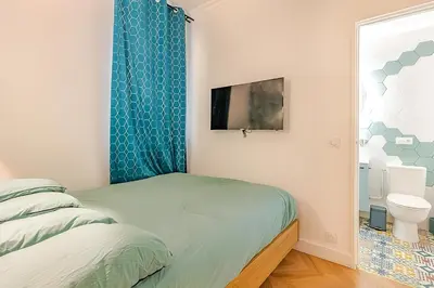 Un ou plusieurs lits dans un hébergement de l'établissement Loft à 2 pas des Champs Elysées et de la Défense!