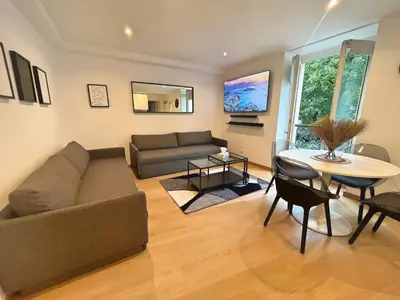 Coin salon dans l'établissement Appartement coup de coeur Montparnasse