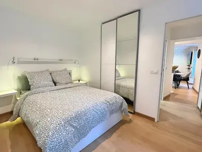 Un ou plusieurs lits dans un hébergement de l'établissement Appartement coup de coeur Montparnasse