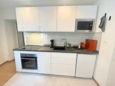 Cuisine ou kitchenette dans l'établissement Appartement coup de coeur Montparnasse