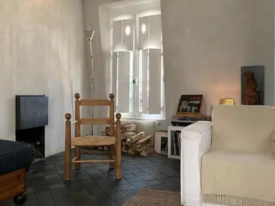 Télévision ou salle de divertissement dans l'établissement Famous parisian designer's pied-à-terre in Le Marais