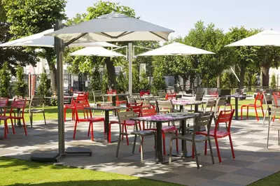 Restaurant ou autre lieu de restauration dans l'établissement Executive Hôtel Paris Gennevilliers