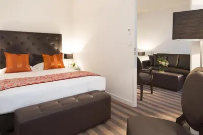 Un ou plusieurs lits dans un hébergement de l'établissement Executive Hôtel Paris Gennevilliers