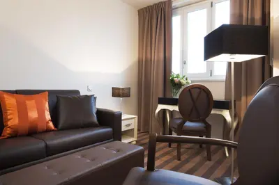 Coin salon dans l'établissement Executive Hôtel Paris Gennevilliers