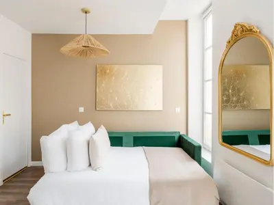 Un ou plusieurs lits dans un hébergement de l'établissement Merveil - Family Suite - Marais - Fbg St Antoine