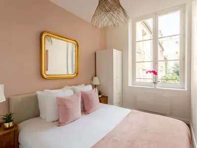 Un ou plusieurs lits dans un hébergement de l'établissement Merveil - Family Suite - Marais - Fbg St Antoine