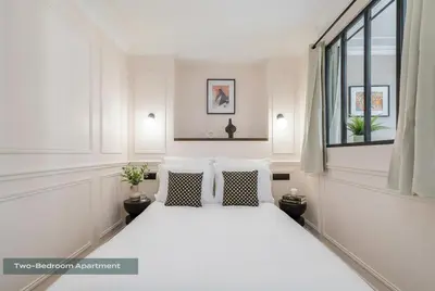 Un ou plusieurs lits dans un hébergement de l'établissement PoeticStay - Louvre